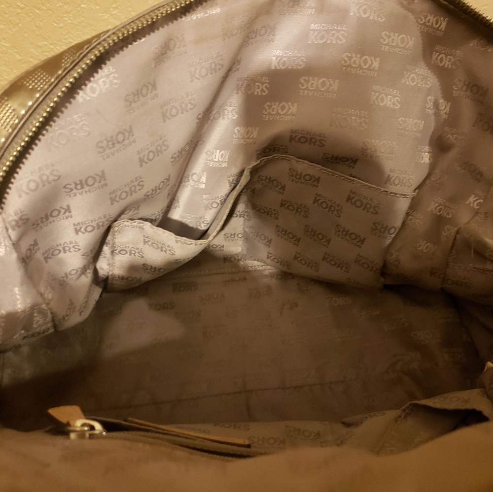 Mirror Metallic MK Satchel

And wallet